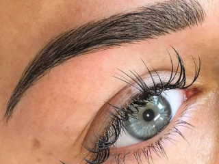 A close up example of a microblade tattoo eyebrow